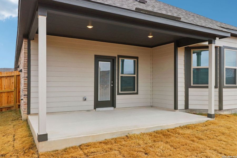 Exterior details and patio area of a home in Kallison Ranch, San Antonio (Image 26).