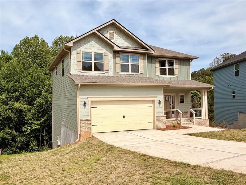 Front exterior of a new home in Magnolia Villas, Cornelia, GA, highlighting curb appeal (Image 21).