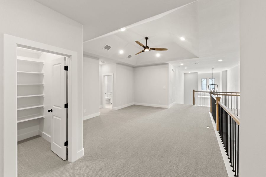 Representative unfurnished interior of a home built from the 5062 by Tradition Homes in Mosaic – 70′ Lots, Prosper (Image 25).