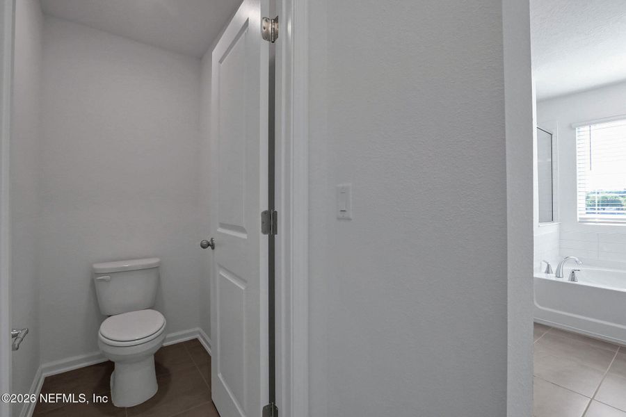 Furnished interior view inside a new home in Amberly, Green Cove Springs (Image 10).