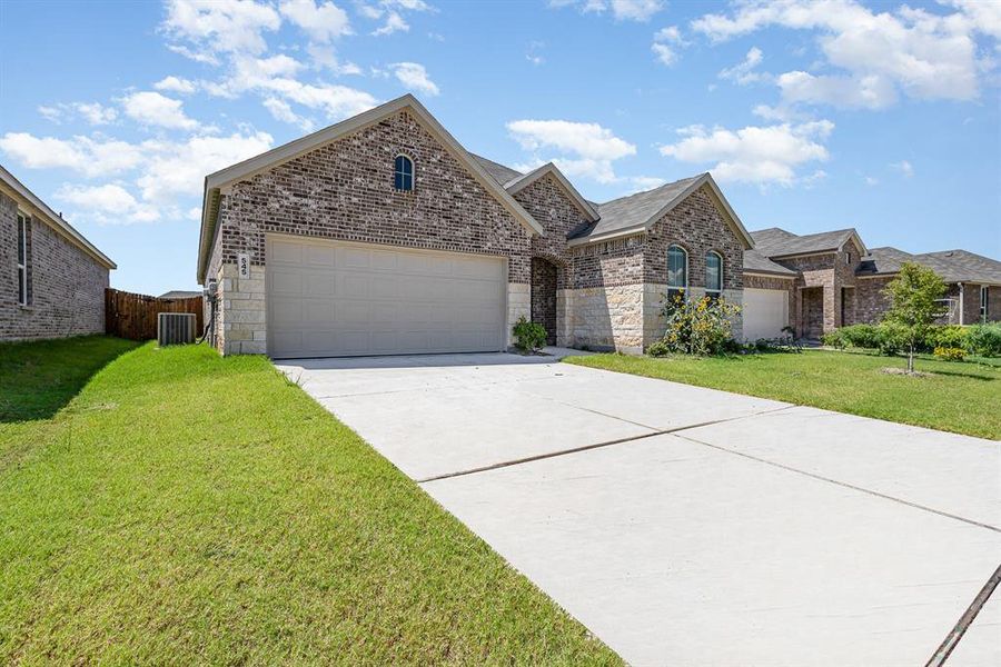 Front exterior of a new home in , Princeton, TX, highlighting curb appeal (Image 2).