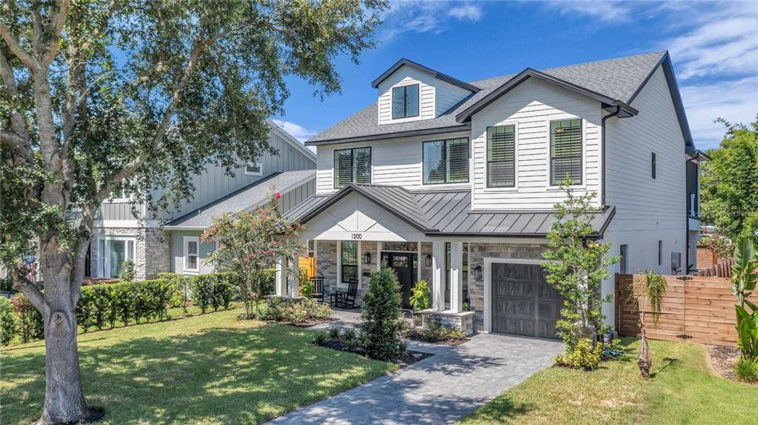 Front exterior of a new home in , Orlando, FL, highlighting curb appeal (Image 2). Front exterior of a new home in , Orlando, FL, highlighting curb appeal (Image 2).