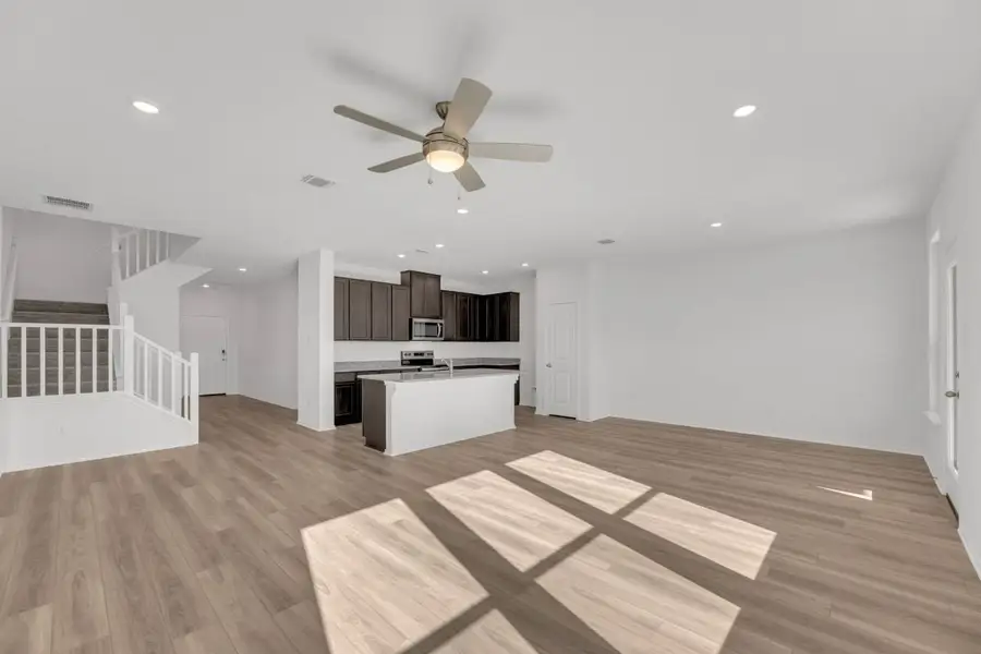 Spacious, unfurnished interior of a new home in Mustang Valley, Manor (Image 6).