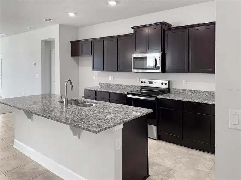 Furnished interior view inside a new home in , St. Cloud (Image 4).