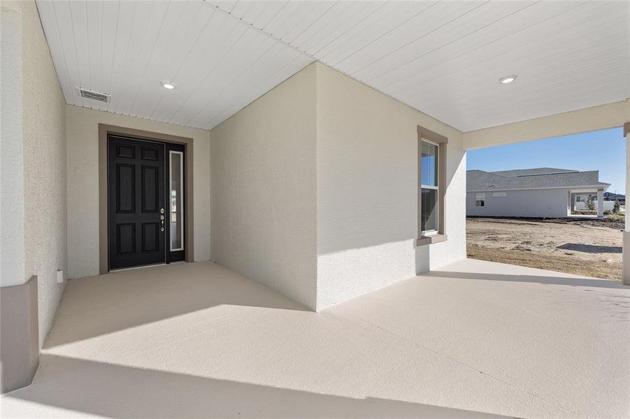 Exterior details and patio area of a home in Calesa Township, Ocala (Image 29).