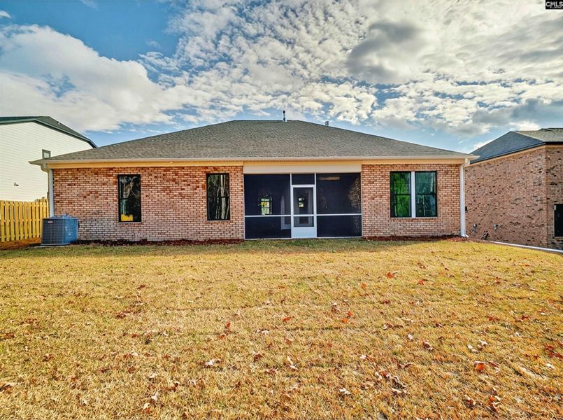 Exterior details and patio area of a home in Collins Cove, Chapin (Image 4).