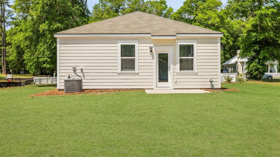 Front exterior of a new home in North Shore, Summerton, SC, highlighting curb appeal (Image 1).