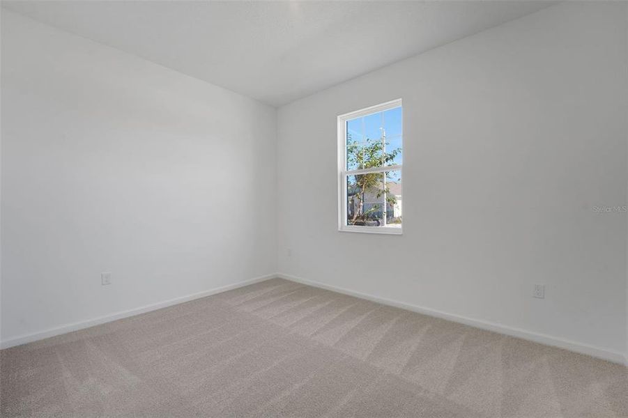 Spacious, unfurnished interior of a new home in Willowbrook North, Winter Haven (Image 27).