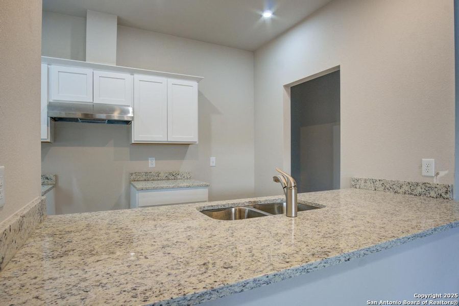 Furnished interior view inside a new home in , San Antonio (Image 7).