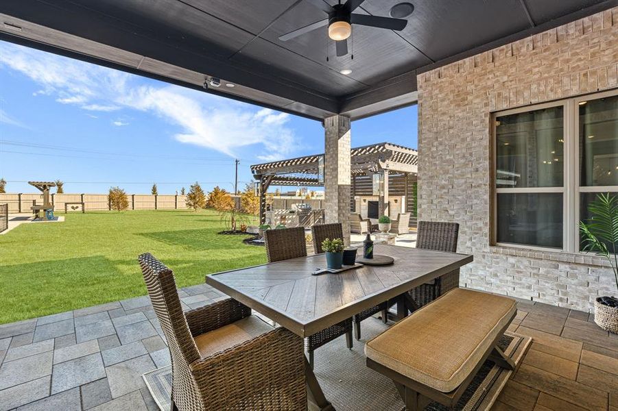 Exterior details and patio area of a home in Pecan Square, Northlake (Image 3).