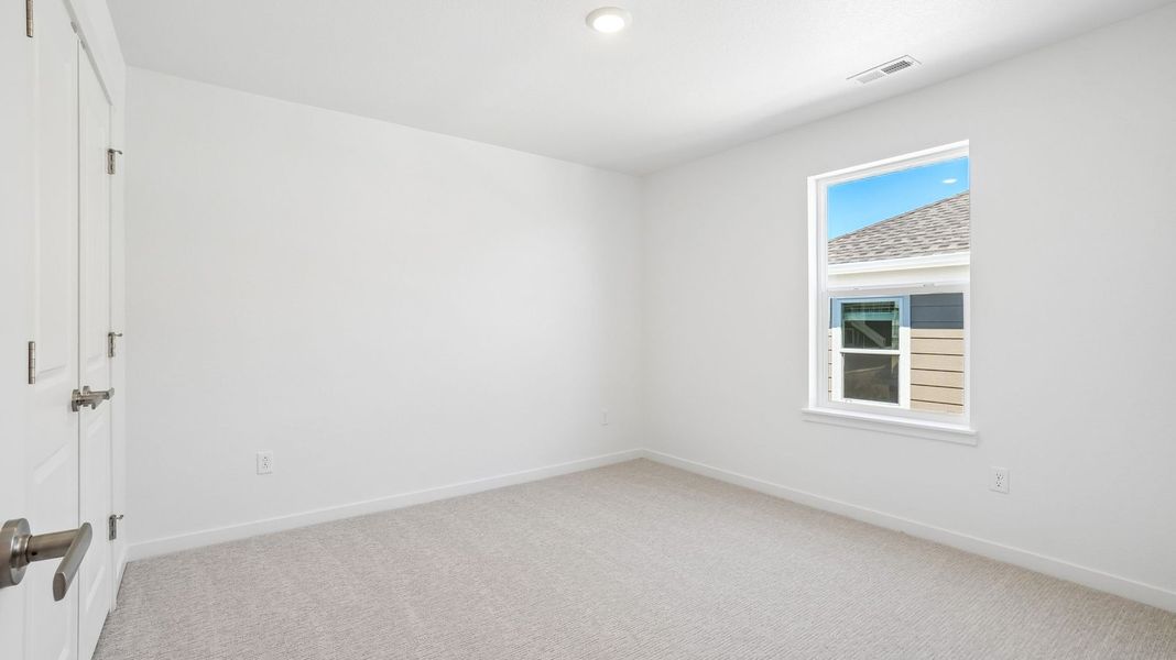 Spacious, unfurnished interior of a new home in Trails at Crowfoot, Parker (Image 15).