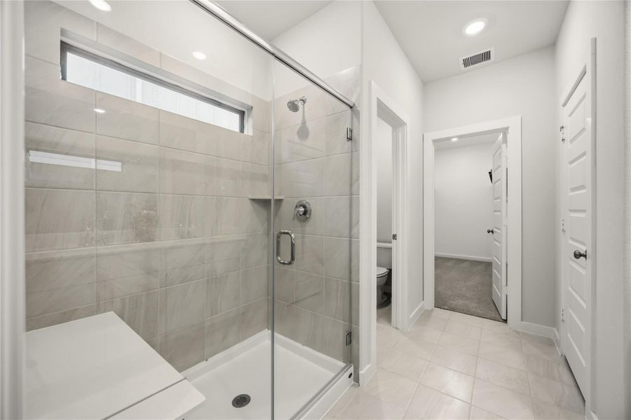 Large primary bath with shower. Large primary bath with shower.