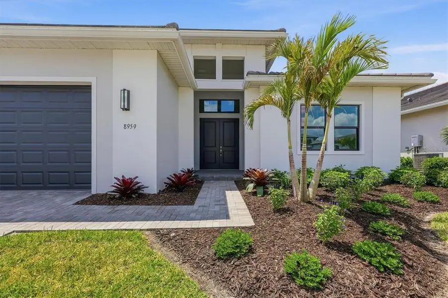 Exterior details and patio area of a home in , Sarasota (Image 3).