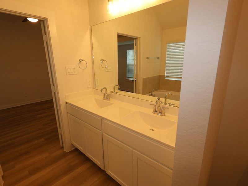 Furnished interior view inside a new home in Pinewood at Grand Texas, New Caney (Image 9).
