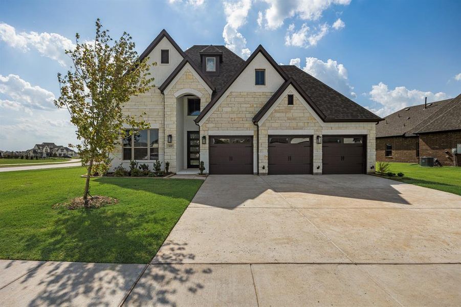 Front exterior of a new home in Heath Golf and Yacht, Heath, TX, highlighting curb appeal (Image 22).