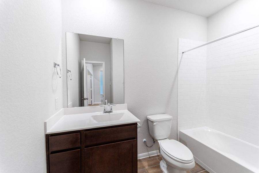 Furnished interior view inside a new home in Canterra Creek, Rosharon (Image 11).