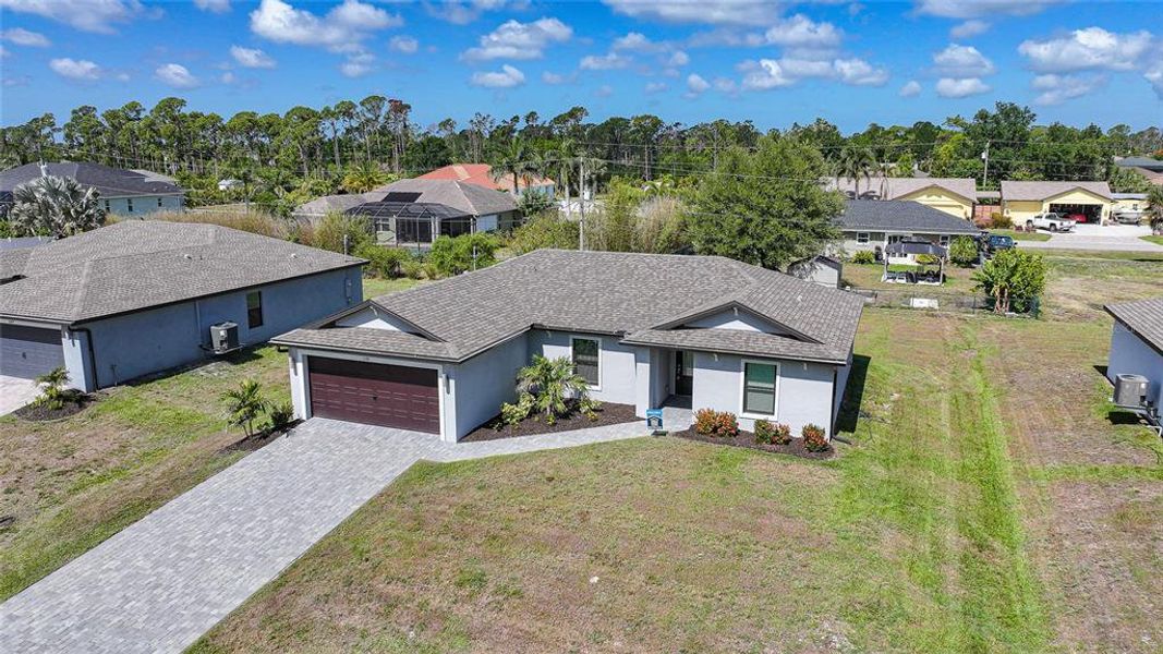 Front exterior of a new home in , Port Charlotte, FL, highlighting curb appeal (Image 23).