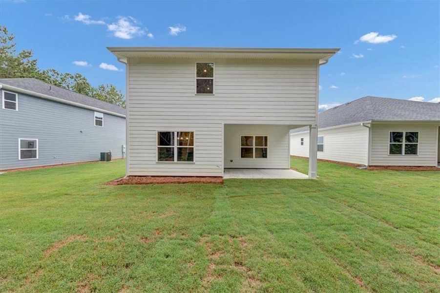 Exterior details and patio area of a home in Canterbury Villas, Carrollton (Image 4).