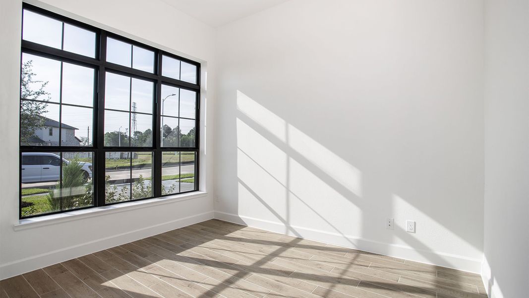Spacious, unfurnished interior of a new home in Legacy Prairie at Katy Court, Katy (Image 15).