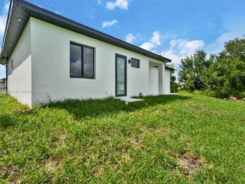 Exterior details and patio area of a home in , Lehigh Acres (Image 22). Exterior details and patio area of a home in , Lehigh Acres (Image 22).