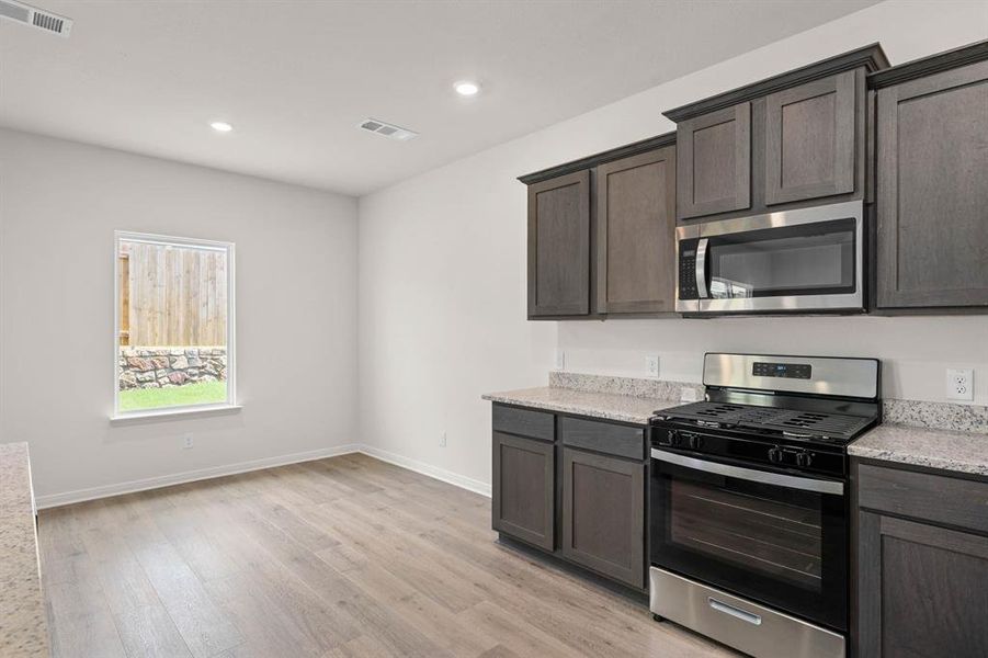 Furnished interior view inside a new home in Patriot Estates, Venus (Image 4).