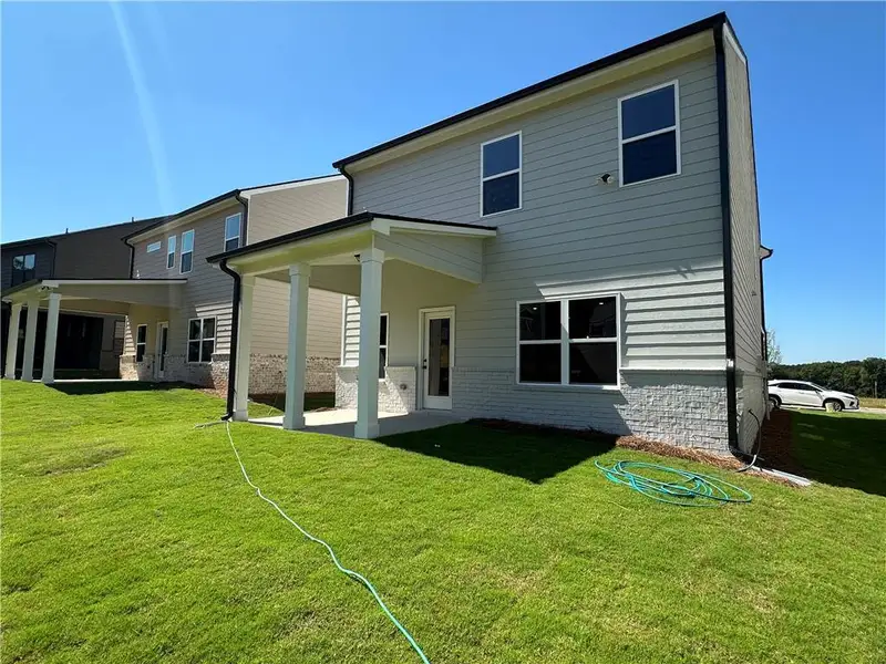 Exterior details and patio area of a home in Kentmere, Auburn (Image 4).