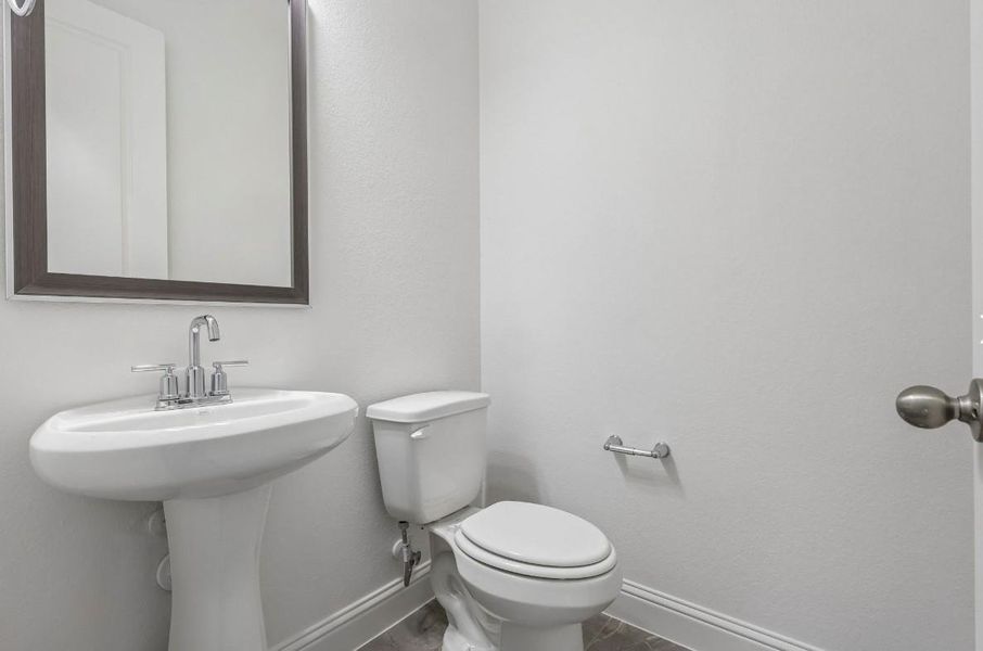 Furnished interior view inside a new home in The Grand Prairie 60', Hockley (Image 5).