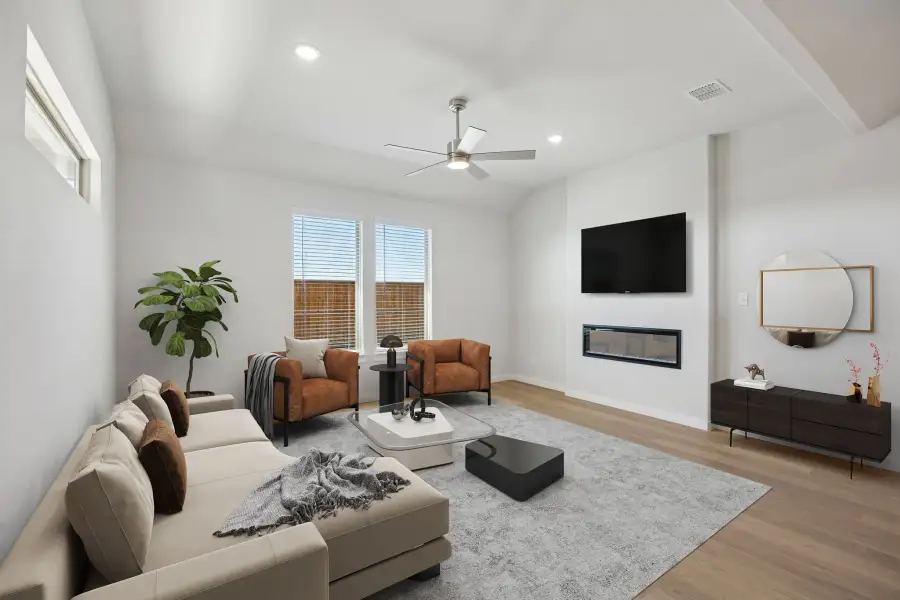 Living Room in the Wimbledon home plan by Trophy Signature Homes – REPRESENTATIVE PHOTO Living Room in the Wimbledon home plan by Trophy Signature Homes – REPRESENTATIVE PHOTO