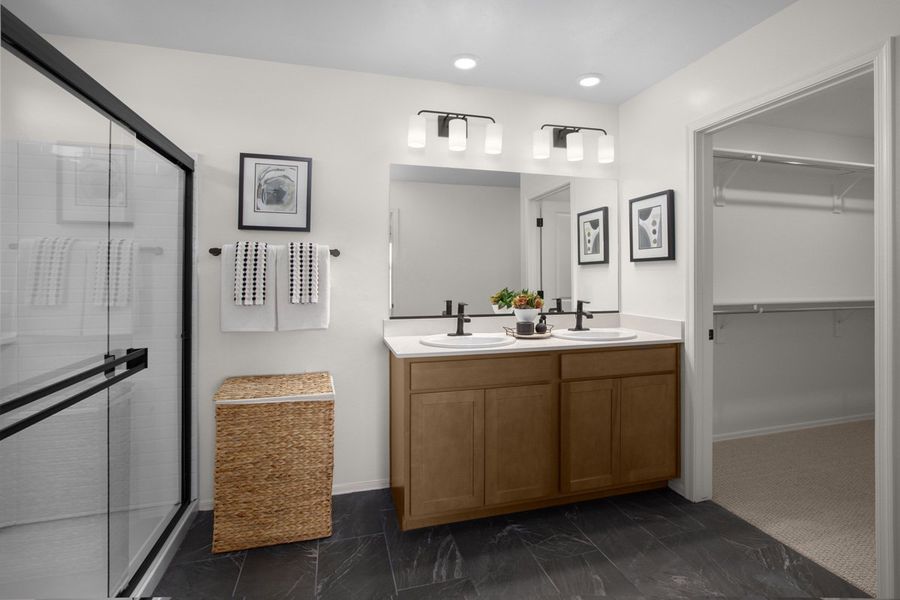 Upgraded shower with cultured marble surround at primary bath Upgraded shower with cultured marble surround at primary bath