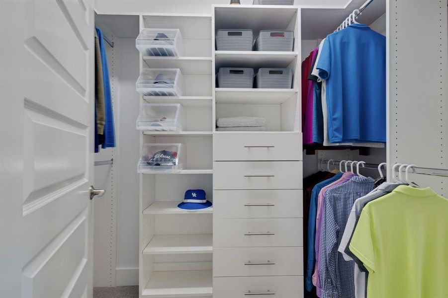 One of two walk-in closets in the Ensuite Primary Bedroom.