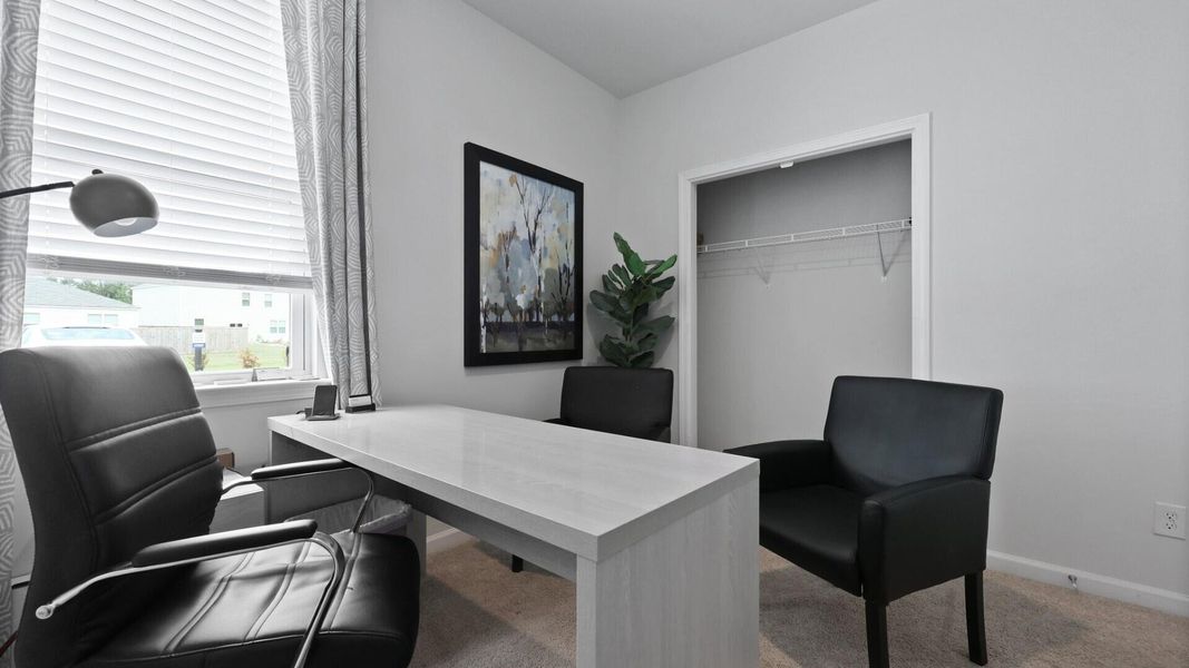 Furnished interior view inside a new home in Pine Hills at Cane Bay, Summerville (Image 25). Furnished interior view inside a new home in Pine Hills at Cane Bay, Summerville (Image 25).
