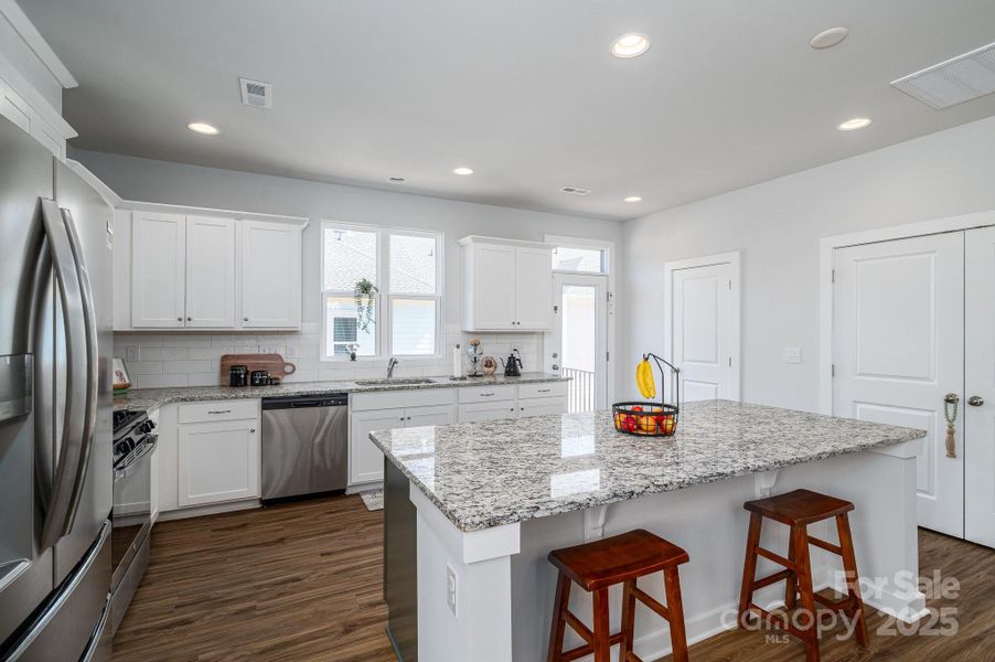 Furnished interior view inside a new home in , Huntersville (Image 6).