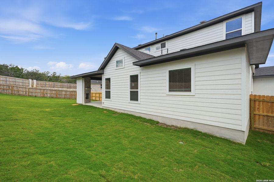 Exterior details and patio area of a home in The Reserve at Potranco Oaks, Castroville (Image 30).