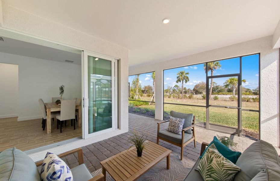 Exterior details and patio area of a home in TerraWalk at Babcock Ranch, Alva (Image 2).