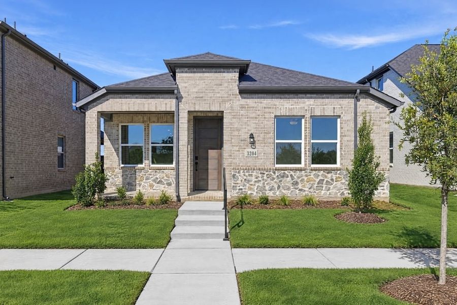 Front exterior of a new home in North Sky Celina, Celina, TX, highlighting curb appeal (Image 1). Front exterior of a new home in North Sky Celina, Celina, TX, highlighting curb appeal (Image 1).