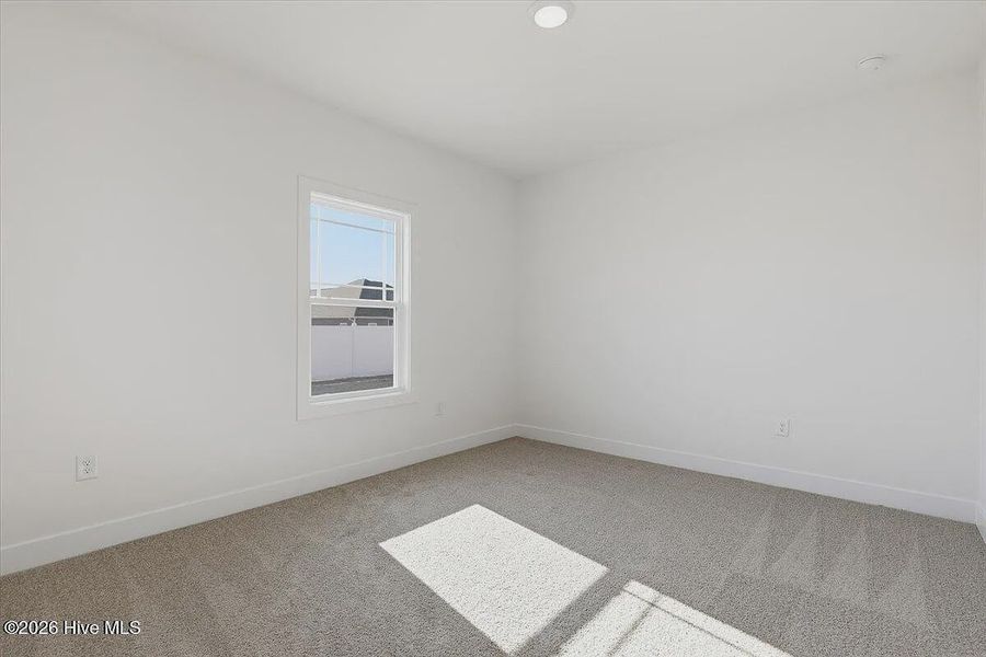 Spacious, unfurnished interior of a new home in Wood Creek Landing, Leland (Image 19). Spacious, unfurnished interior of a new home in Wood Creek Landing, Leland (Image 19).