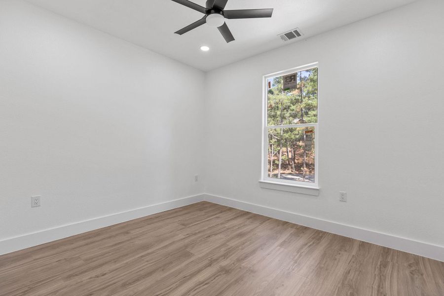 Unfurnished room with wood finished floors, recessed lighting, and ceiling fan