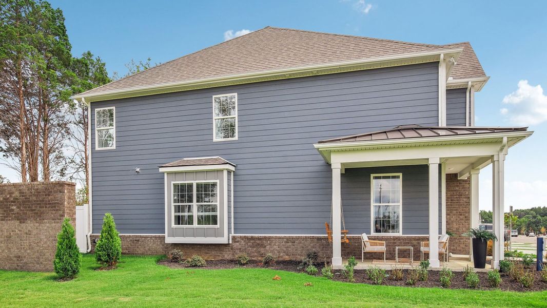 Representative exterior photo of a completed home built from the MEDFORD by D.R. Horton in River Landing Townhomes, Murfreesboro, TN (Image 20).