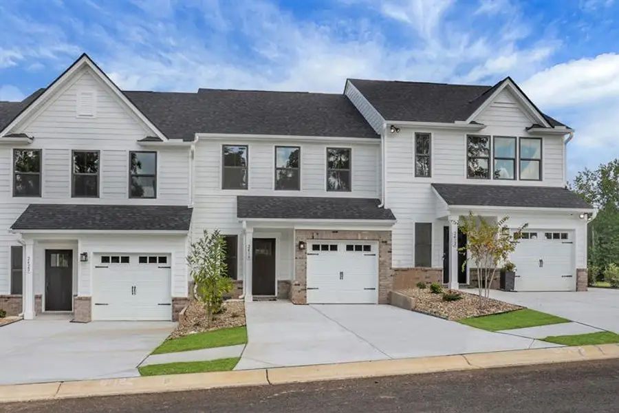 Front exterior of a new home in Laurel Fields, Gainesville, GA, highlighting curb appeal (Image 21).