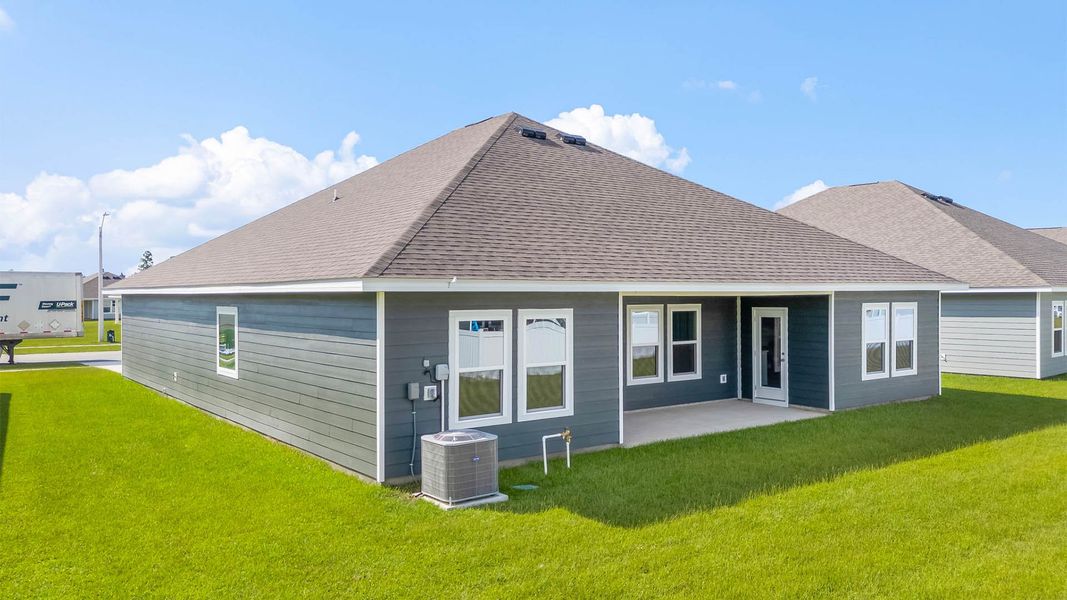 Front exterior of a new home in Liberty, Panama City, FL, highlighting curb appeal (Image 19).