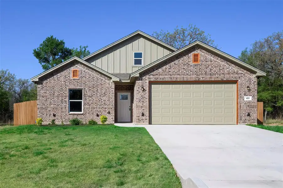 Front exterior of a new home in , Mineral Wells, TX, highlighting curb appeal (Image 1). Front exterior of a new home in , Mineral Wells, TX, highlighting curb appeal (Image 1).