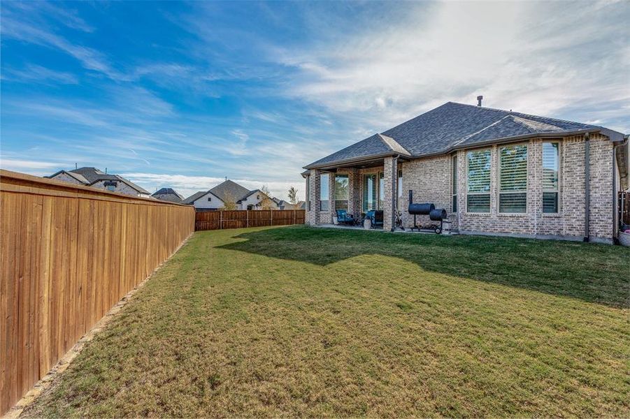 Front exterior of a new home in Wildridge, Oak Point, TX, highlighting curb appeal (Image 18). Front exterior of a new home in Wildridge, Oak Point, TX, highlighting curb appeal (Image 18).