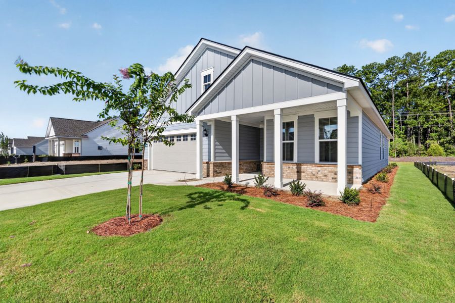 Front exterior of a new home in Del Webb Charleston at Nexton, Summerville, SC, highlighting curb appeal (Image 21).
