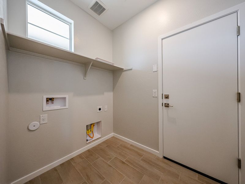 A room with a door and a window.