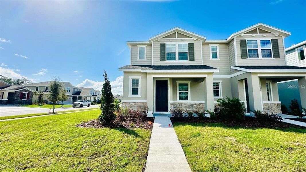 Front exterior of a new home in , Kissimmee, FL, highlighting curb appeal (Image 2). Front exterior of a new home in , Kissimmee, FL, highlighting curb appeal (Image 2).