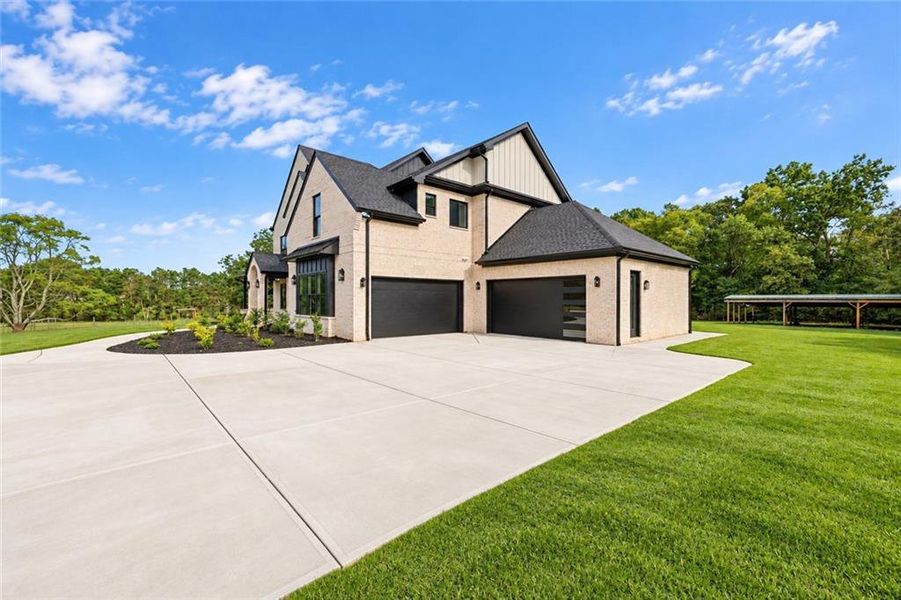 Front exterior of a new home in , Monroe, GA, highlighting curb appeal (Image 28).
