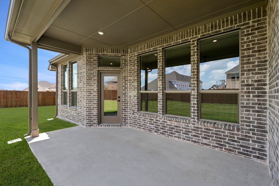 Exterior details and patio area of a home in Lovers Landing, Forney (Image 3).