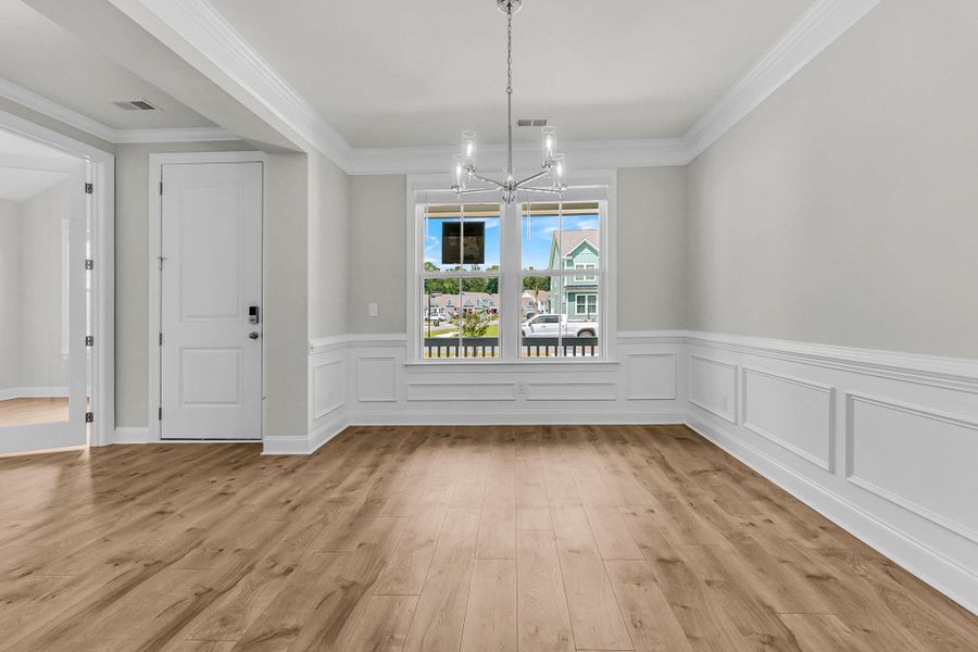 Spacious, unfurnished interior of a new home in Tidewater at Lakes of Cane Bay, Summerville (Image 19).