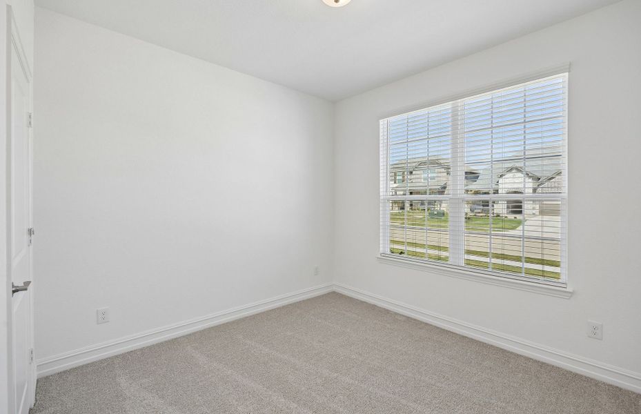 Spacious, unfurnished interior of a new home in Rosemary Fields, Godley (Image 13).