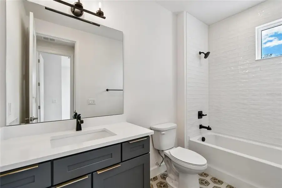 Furnished interior view inside a new home in EvenTide, New Smyrna Beach (Image 17).